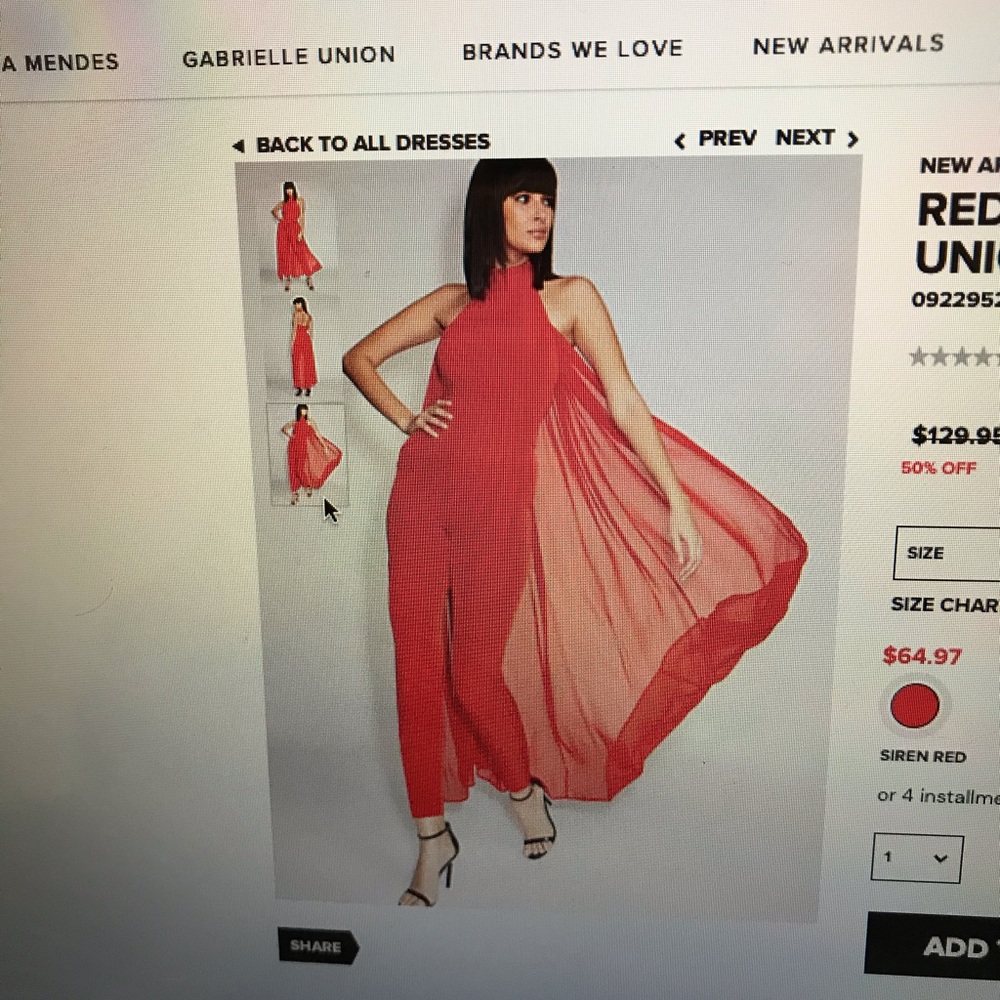 Red jumpsuit with cape